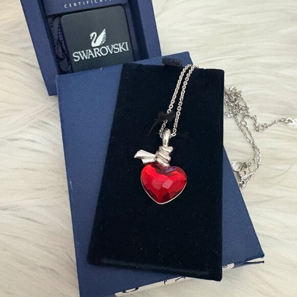 Swarovski Ties of Love pendant necklace with a red heart-shaped crystal. - Picture 1 of 11